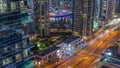 Aerial view on Dubai Marina skyscrapers and the most luxury yacht in harbor night timelapse, Dubai, United Arab Emirates Royalty Free Stock Photo