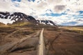 Road trip with 4x4 car on dirt road among remote wilderness on volcanic area in Icelandic highlands on summer at Landmannalaugar, Royalty Free Stock Photo