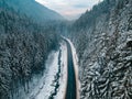 aerial view of road in winter carpathian mountains