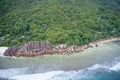 Aerial view of rocks, cliff and beach forming patterns in nature background La Digue, Seychelles Royalty Free Stock Photo