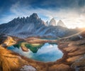 Aerial view of rocks, mountain lake, reflection in water Royalty Free Stock Photo