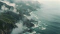 Aerial View of Rocky Coastline Along a Vast Body of Water, Overhead view of misty sea and jagged coastlines