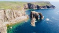 Aerial view of a rocky coastline with the Enys Dodnan Arch Royalty Free Stock Photo