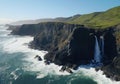 Aerial view of rocky coastline. Waves hitting in rocks. Birds eye view of the sea, cinimatic sea and moutain view. AI Generative