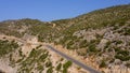 Aerial view rocky mountain with country road. Royalty Free Stock Photo