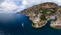 Aerial view of the rocky seashore of southern Italy. Boat. Incredible beauty panorama of mountains and sea. Travel and tourism. Royalty Free Stock Photo