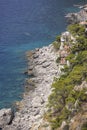 Aerial view of rocky shoreline on the Tyrrhenian Sea nearby Marina Piccola, Capri Island, Italy Royalty Free Stock Photo
