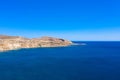 Aerial view of a rocky stone island in clear green blue sea, Greece Royalty Free Stock Photo