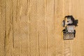 Aerial View. Roller steamroller or vibratory roller machine working on road construction site of new road. Highway Royalty Free Stock Photo