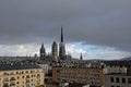 Aerial view on the roman catholic cathedral under dark storm clouds of Rouen, France
