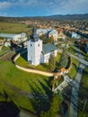 Aerial view of Roman Catholic Church of All Saints in Ocova in podpolanie region during winter