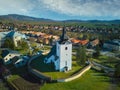 Aerial view of Roman Catholic Church of All Saints in Ocova in podpolanie region during winter