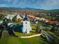 Aerial view of Roman Catholic Church of All Saints in Ocova in podpolanie region during winter