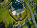 Aerial view of Roman Catholic Church of All Saints in Ocova in podpolanie region during winter