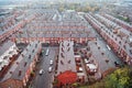 Seen from above, tightly packed rows of terraced houses in Gorton, Manchester.