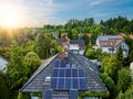 Aerial view of the roofs of houses covered with solar panels. sunny. Royalty Free Stock Photo