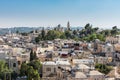 Aerial view of rooftops of buildings in the old city with Abbey of the Dormition of Jerusalem. View from the Lutheran Church of