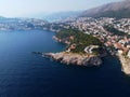 Aerial view of rooftops of Dubrovnik old historical town and Adriatic sea in Croatia. UNESCO World Heritage site, Famous