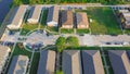 Aerial view row of condo homes, townhouses, duplex with cul-de-sac, vacant land near Farrar Canal along Roger Drive in urban Royalty Free Stock Photo