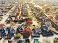 Aerial view row of new house with cul-de-sac dead-end and bright orange color fall foliage near Dallas Royalty Free Stock Photo