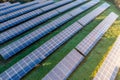 Aerial view of solar panels on farmland generating clean and renewable electricity