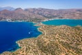 Aerial view of the rugged coastline of Crete and the clear waters of the Aegean Sea