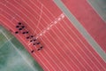 Aerial view of a running track with a group of runners. Royalty Free Stock Photo