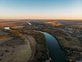 Aerial view of rural countryside, beautiful autumn nature landscape panorama from above with big river and farm fields Royalty Free Stock Photo