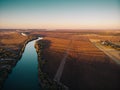 Aerial view of rural countryside, beautiful autumn nature landscape panorama from above with big river and farm fields Royalty Free Stock Photo