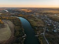 Aerial view of rural countryside, beautiful autumn nature landscape panorama from above with big river and farm fields Royalty Free Stock Photo