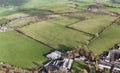 Aerial view of a rural countryside under a bright sky in New Cumnock, Scotland Royalty Free Stock Photo