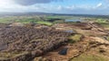 Aerial view of a rural countryside under a bright sky in New Cumnock, Scotland Royalty Free Stock Photo