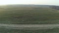 Aerial view of rural field and country side road