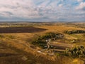 Aerial view rural landscape, small village with houses among agricultural fields and meadows Royalty Free Stock Photo