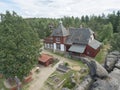 Aerial view of rustic building of Topferbaude restaurant and hut from viewpoint at top of hill Topfer near Oybin at Royalty Free Stock Photo