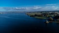 Aerial view of Rutland Water reservoir lake at sunset and foggy. Royalty Free Stock Photo