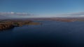 Aerial view of Rutland Water reservoir lake at sunset and foggy. Royalty Free Stock Photo