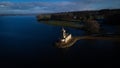 Aerial view of Rutland Water reservoir lake at sunset and foggy. Royalty Free Stock Photo