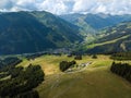 Aerial view on the Saalbach skiing region in Austria with mountainbike trails and hikers with great mountain panorama in Royalty Free Stock Photo