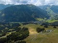 Aerial view on the Saalbach skiing region in Austria with mountainbike trails and hikers with great mountain panorama in Royalty Free Stock Photo