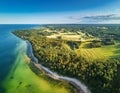 An aerial view of Saaremaa island featuring patchwork fields, forests, and coastal cliffs meeting the Baltic Sea Royalty Free Stock Photo