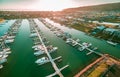 Aerial view of Safety Beach suburb and marina at sunset. Morning