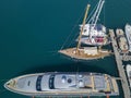 Aerial view of sailboats and moored boats. Boats moored in the port of Vibo Marina, quay, pier.