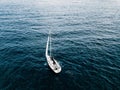 Aerial view of sailing ship yacht at deep open sea Royalty Free Stock Photo