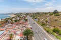 Aerial view at the samba road in the Luanda city downtown center with road, vehicles and buildings