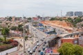 Aerial view at the samba road in the Luanda city downtown center with road, vehicles and buildings