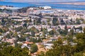 Aerial view of San Carlos in Silicon Valley ; residential areas with houses built on hills in the foreground; industrial areas and Royalty Free Stock Photo