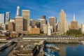 Aerial view of the San Francisco, California, skyline at sunrise from the embarcadero area. Ample copy space in blue sky. Ferry bu Royalty Free Stock Photo
