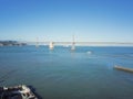 Aerial view San Francisco-Oakland Bay Bridge and Pier 1 waterfront Royalty Free Stock Photo