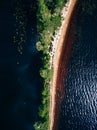 Aerial view of the sand spit with forest. Summer landscape with a blue lake in Finland Royalty Free Stock Photo